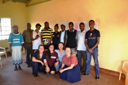 Students with farmers after a Focus Group Discussion  on macademia at the chief’s camp