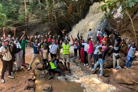 ungss students at waterfall in karura